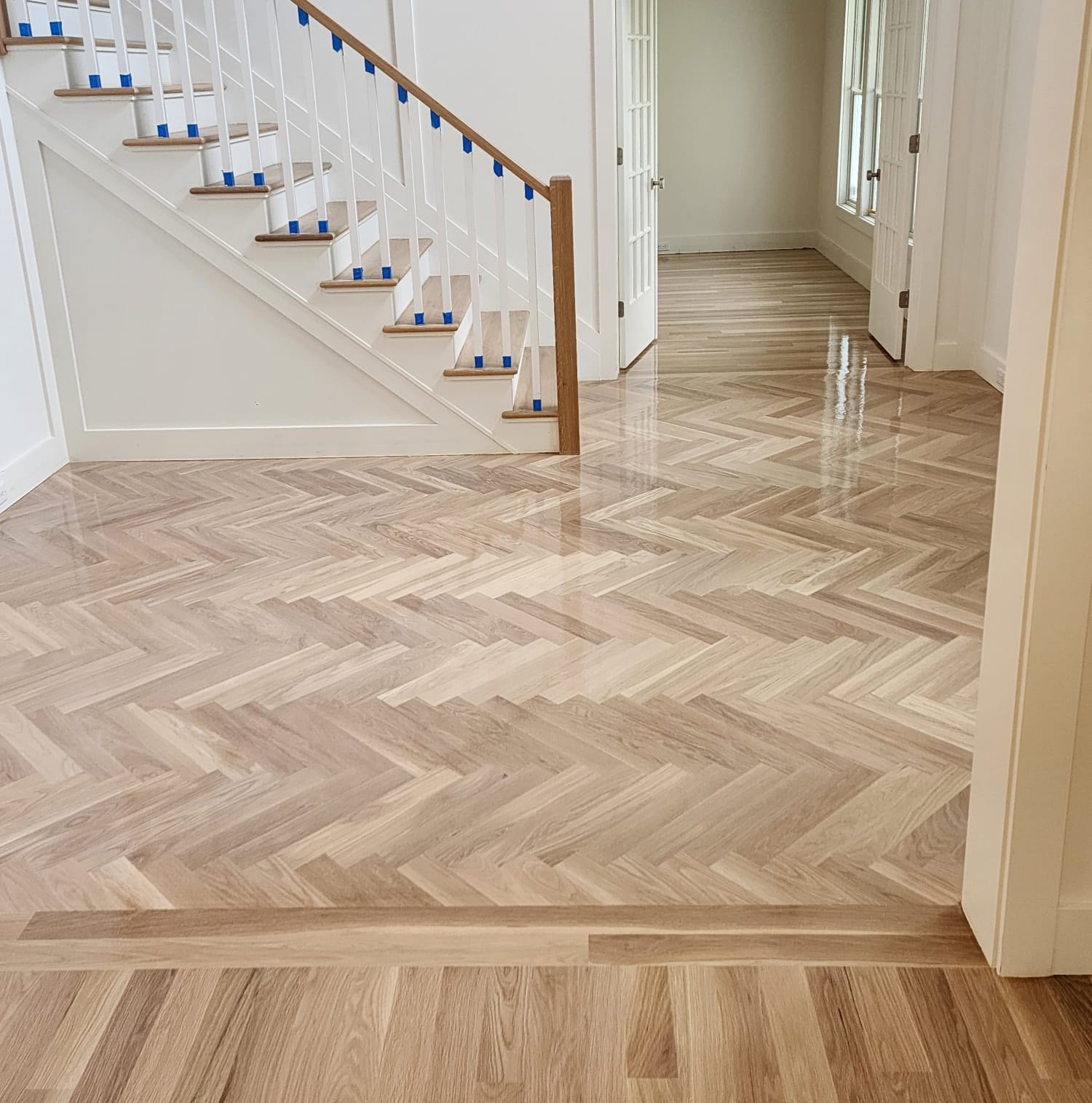Beautiful hardwood flooring in a sunlit living room
